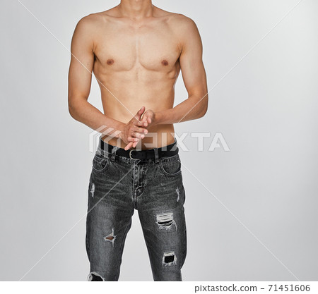 Sexy muscular man's body wearing jeans Sexy muscular man's body wearing jeans 71451606