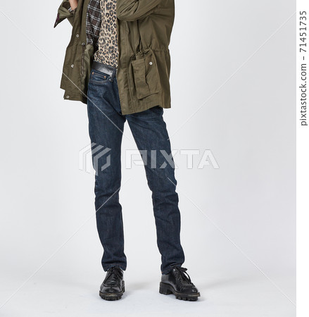 Standing man wearing blue skinny jeans, slim body Standing man wearing blue skinny jeans, slim body 71451735