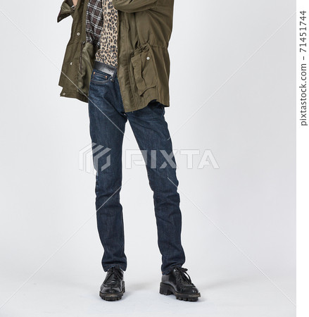 Standing man wearing blue skinny jeans, slim body Standing man wearing blue skinny jeans, slim body 71451744
