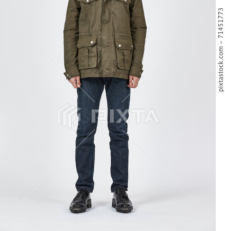 Standing man wearing blue skinny jeans, slim body Standing man wearing blue skinny jeans, slim body 71451773