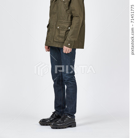 Standing man wearing blue skinny jeans, slim body Standing man wearing blue skinny jeans, slim body 71451775