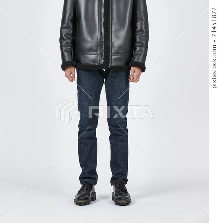 Standing man wearing blue skinny jeans, slim body Standing man wearing blue skinny jeans, slim body 71451872