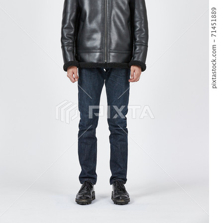 Standing man wearing blue skinny jeans, slim body Standing man wearing blue skinny jeans, slim body 71451889