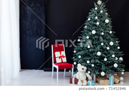 Christmas tree pine with gifts new year decor black background 71452946