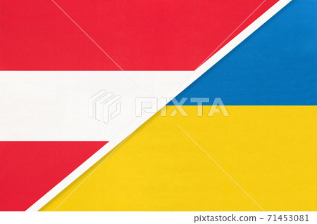 Austria and Ukraine, symbol of national flags from textile. Austria and Ukraine, symbol of national flags from textile. 71453081