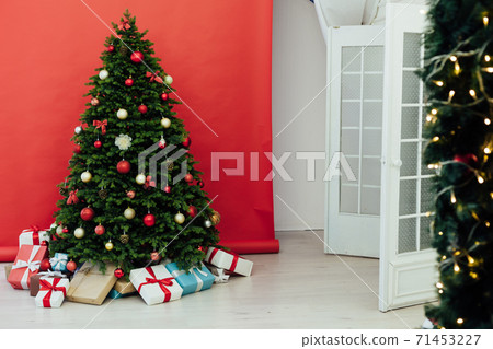 Christmas tree pine with gifts for the new year red decor winter Christmas tree pine with gifts for the new year red decor winter 71453227
