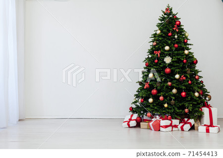 Christmas tree pine with gifts for the new year decor background place for the inscription 71454413