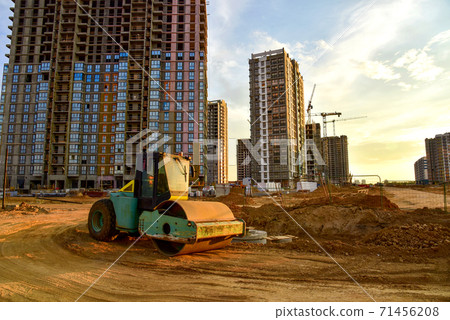 Vibro Roller Soil Compactor leveling ground at construction site. Vibration single-cylinder  71456208