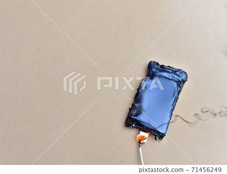 Mobile phone caught fire from the wire with recharging from the electrical network  71456249