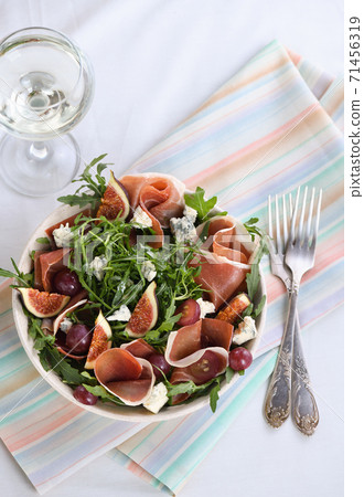 Salad with cheese, arugula with ham Salad with cheese, arugula with ham 71456319