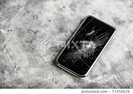 Smartphone with cracked screen 71456626