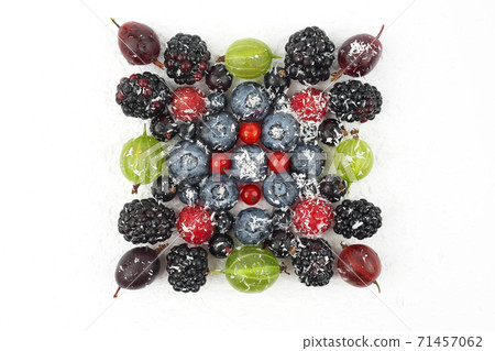 lot of different berries in the shape of a square 71457062