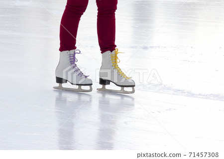 foot ice-skating girls on the ice rink foot ice-skating girls on the ice rink 71457308