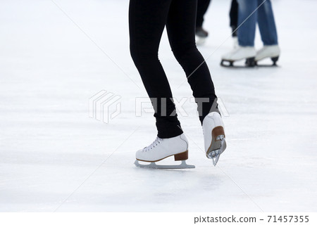 feet skating on the ice rink feet skating on the ice rink 71457355
