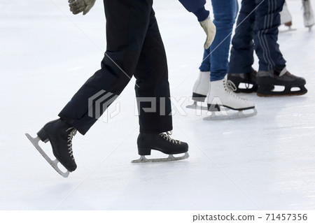 feet skating on the ice rink. feet skating on the ice rink. 71457356