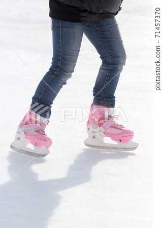 feet skating on the ice rink feet skating on the ice rink 71457370