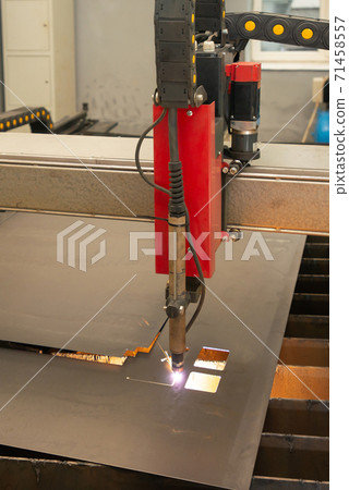 Industrial laser or plasma cutting processing manufacture technology of flat metal sheet. steel material with sparks 71458557