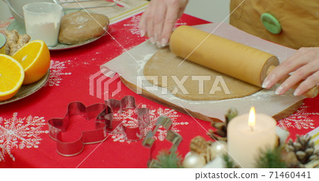Flat lay. Step by step. Rolling out gingerbread cookie dough to bake Christmas cookies. Flat lay. Step by step. Rolling out gingerbread cookie dough to bake Christmas cookies. 71460441