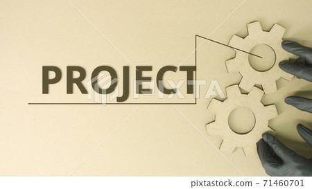 Project word and cardboard cog wheels Project word and cardboard cog wheels 71460701