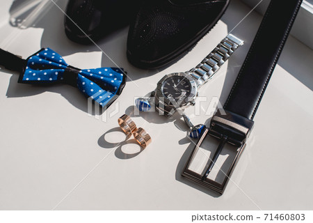 Wedding rings. Black leather shoes, watch, blue 71460803