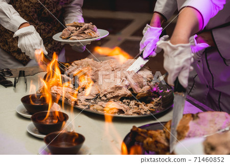 appetizing grilled meat on fire close-up. appetizing grilled meat on fire close-up. 71460852