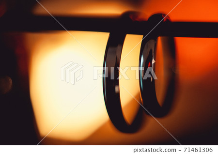Classic gold wedding ring hung on a background of Classic gold wedding ring hung on a background of 71461306