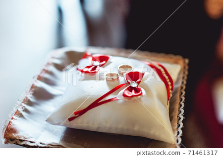 wedding rings on a tiny pillow wedding rings on a tiny pillow 71461317