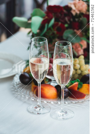 Glasses with champagne drink on a table. Happy Glasses with champagne drink on a table. Happy 71461562