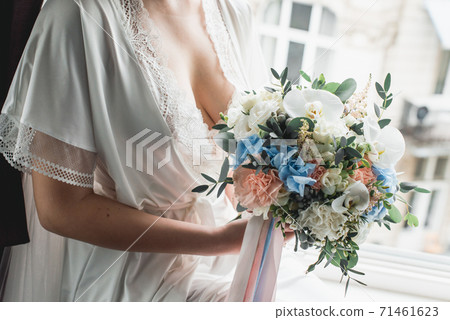 luxurious wedding bouquet made of roses, carnation 71461623