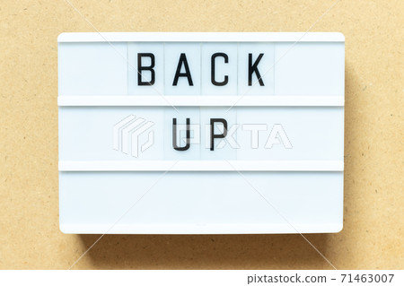Lightbox with word back up on wood background Lightbox with word back up on wood background 71463007