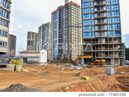 Excavator working at largest construction site. Excavator working at largest construction site. 71465298