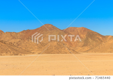 View of Arabian desert and mountain range Red Sea Hills in Egypt View of Arabian desert and mountain range Red Sea Hills in Egypt 71465440
