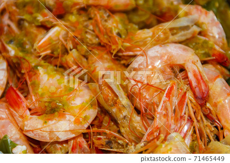Close-up of baked shrimps. Food background 71465449