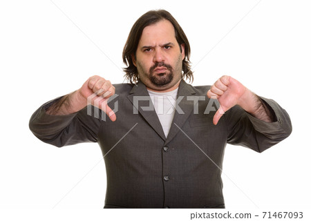 Fat Caucasian businessman giving two thumbs down 71467093