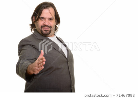 Happy fat Caucasian businessman smiling and giving handshake Happy fat Caucasian businessman smiling and giving handshake 71467098