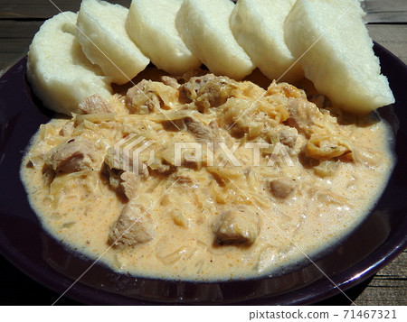 Pork, dumplings, cabbage. 71467321