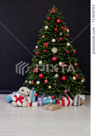 Christmas tree pine with gifts new year decor interior of the holiday postcard Christmas tree pine with gifts new year decor interior of the holiday postcard 71469763