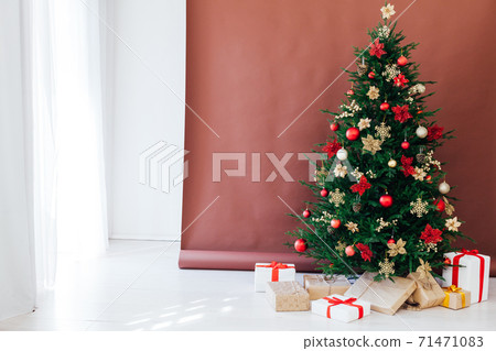 Christmas tree pine with gifts for the new year postcard banner brown background 71471083