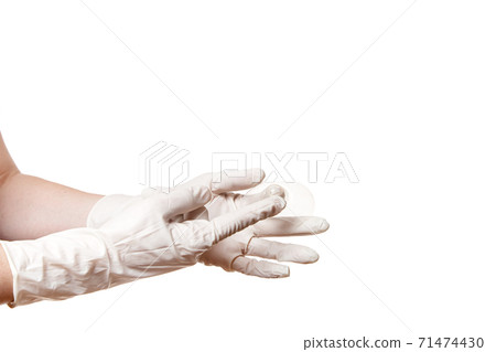 hand with glove hold and point finger contact nipple shield nippleshield for breastfeeding with latch difficulties inverted nipples, silicone nipple protectors isolated on white background copy space. hand with glove hold and point finger contact nipple shield nippleshield for breastfeeding with latch difficulties inverted nipples, silicone nipple protectors isolated on white background copy space. 71474430