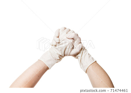 hands in a medical sterile gloves shows hands together gesture of support and trust, concept mock up isolated on white background with copy space. 71474461