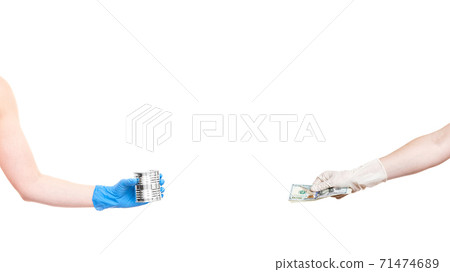 hand in sterile medical glove holds un label iron tin can and hand holds out money to pay for food delivery, quarantine social destination mockup concept isolated on white background with copy space. hand in sterile medical glove holds un label iron tin can and hand holds out money to pay for food delivery, quarantine social destination mockup concept isolated on white background with copy space. 71474689