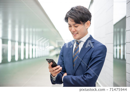 A young businessman A young businessman 71475944