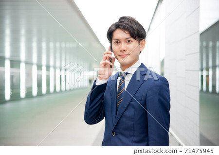 A young businessman A young businessman 71475945