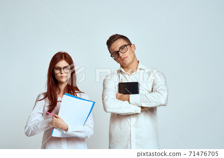 business man and woman secretary documents employees colleagues on light background cropped view business man and woman secretary documents employees colleagues on light background cropped view 71476705