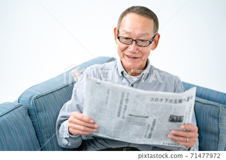 Senior men reading newspaper 71477972