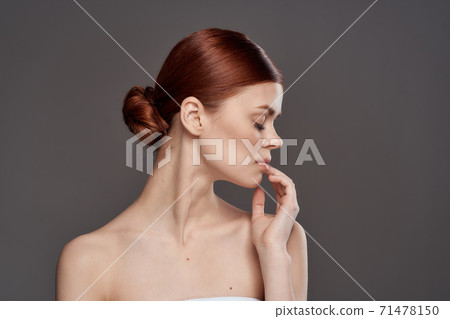 Beautiful woman naked shoulders cosmetics clean skin charm gray background studio Beautiful woman naked shoulders cosmetics clean skin charm gray background studio 71478150