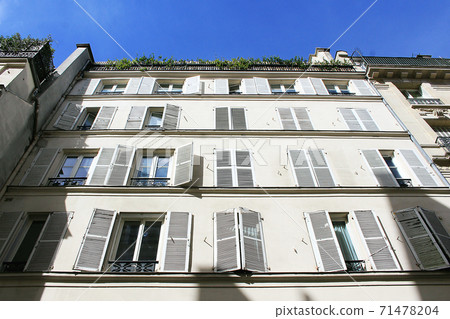 Paris apartment exterior and blue sky 71478204