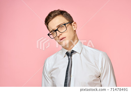 Business man in white shirt with tie wearing glasses self-confidence official pink background 71478491