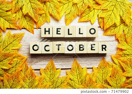 Happy October alphabet letter with maple leaves decoration on wooden background Happy October alphabet letter with maple leaves decoration on wooden background 71479902