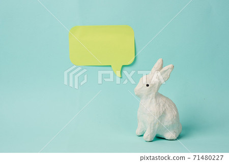 Easter bunny with a label for the inscription on a light background sticker Copy Space Easter bunny with a label for the inscription on a light background sticker Copy Space 71480227